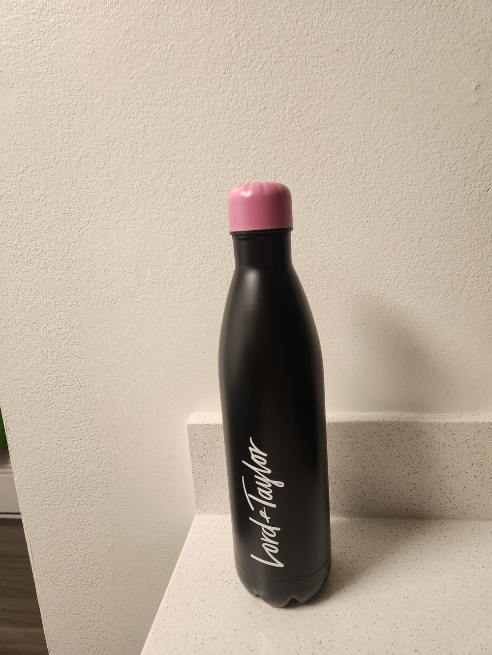 Lord & Taylor Black Bottle with Pink Lid